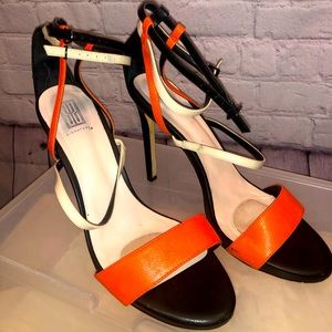 Black, tan, and orange sandal heels